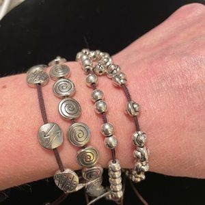 (2)Silver bead cord bracelets NWOT not worn. Very cute to stack.